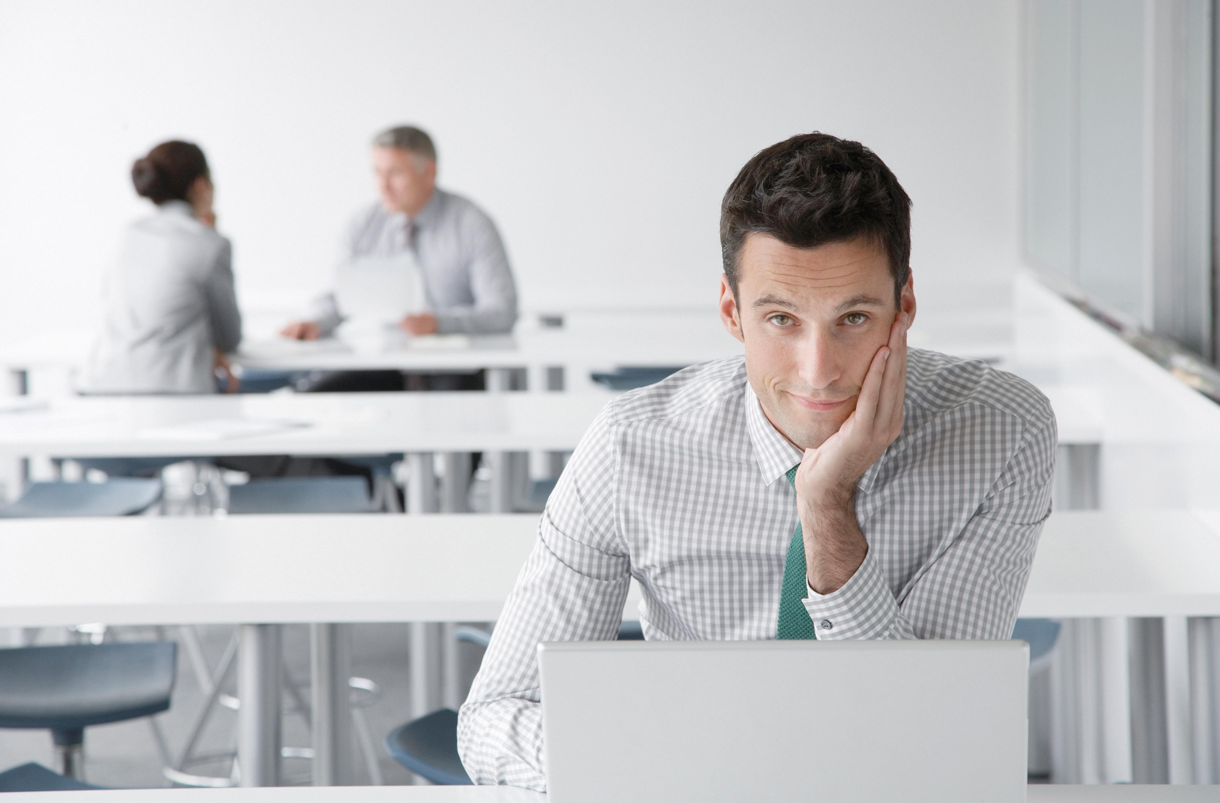 man sitting on a desk